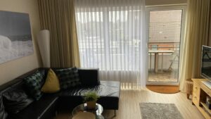 Das Wohnzimmer und Balkon, Ferienwohnung Witthöhn